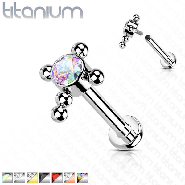 Titanium intern geschroefde labret piercing met balletjes in kruis en CZ steen