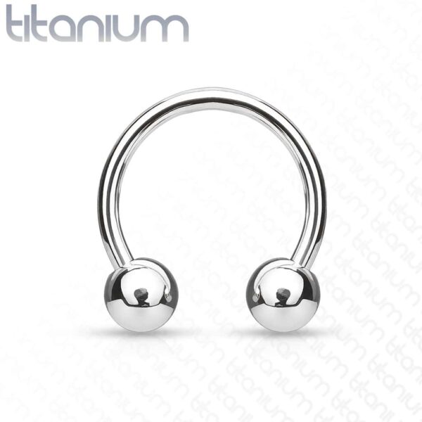 Circular barbell van titanium met balletjes