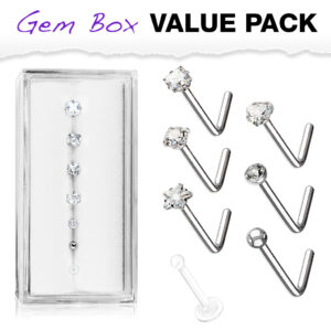 Set van 7 verschillende neus stud piercings in een doorzichtig doosje
