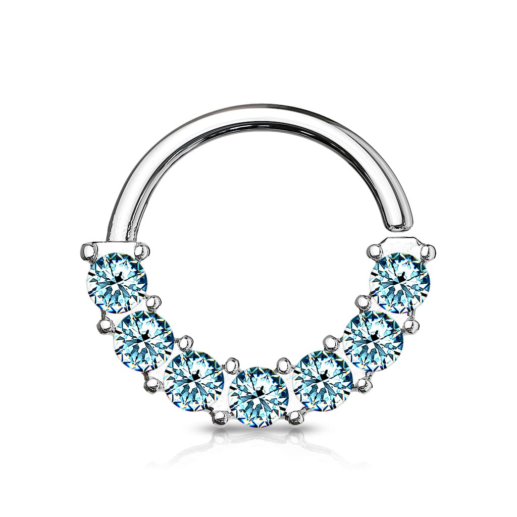 Buigbare ring met 7 steentjes aan de voorkant (Dikte: 1 mm, Kleur: Zilverkleurig, Steenkleur: Babyblauw)